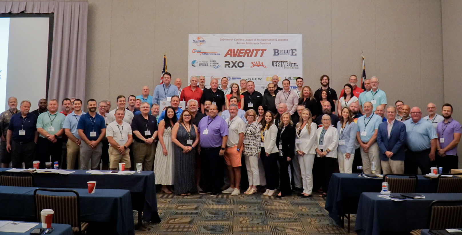 Participants engaged in conversations at a warehousing and distribution event near Charlotte during the North Carolina logistics conference.