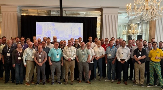 Group of AWI members at 3PL warehousing conference near Charlotte NC in a chandelier-lit ballroom