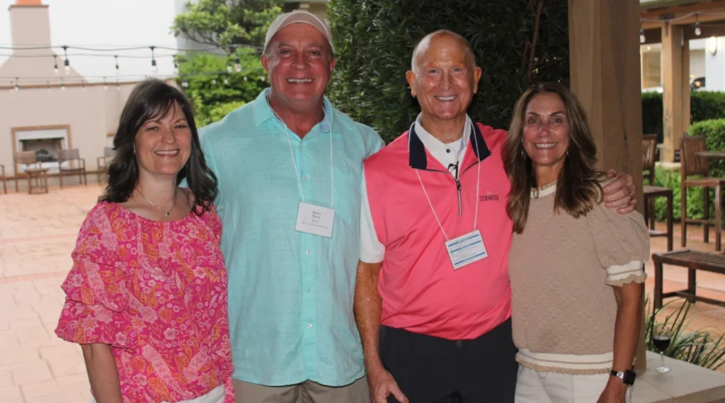 Four Cargo Integrated Logistics professionals at a Claremont, NC event highlighting 3PL warehousing, secure trailer parking and integrated logistics solutions