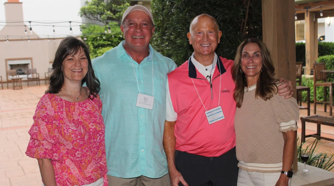Four Cargo Integrated Logistics professionals at a Claremont, NC event highlighting 3PL warehousing, secure trailer parking and integrated logistics solutions