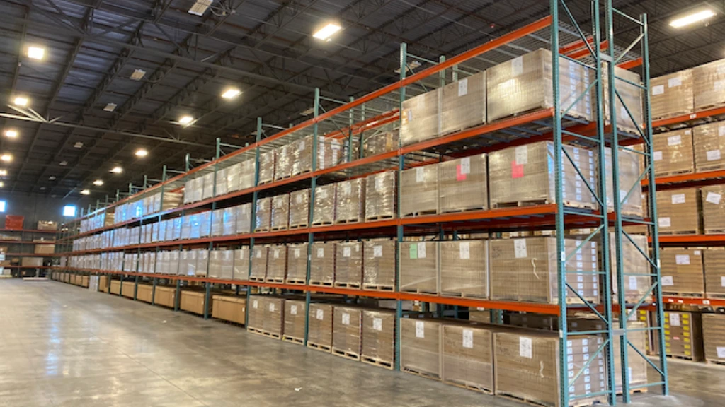 Workers at a North Carolina 3PL warehouse managing daily distribution tasks