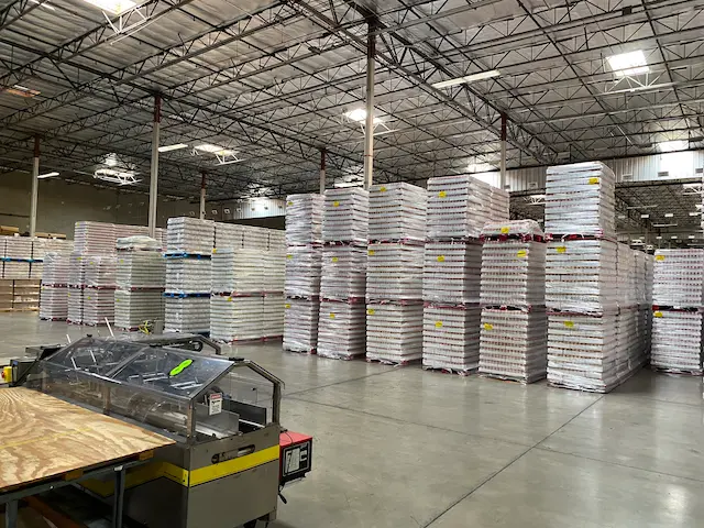 Spacious interior of a 3pl warehouse in Charlotte, North Carolina, organized for manufacturing plant support warehousing and efficient warehouse distribution.